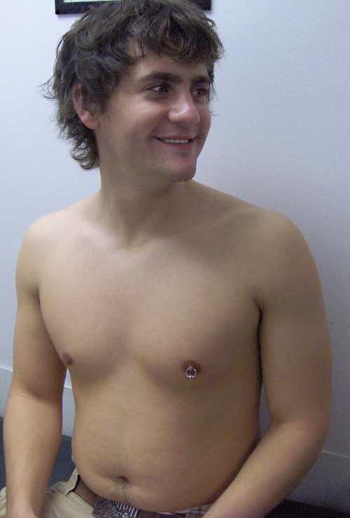  this pic of 19-yr-old me, beaming right after getting my nipple pierced.