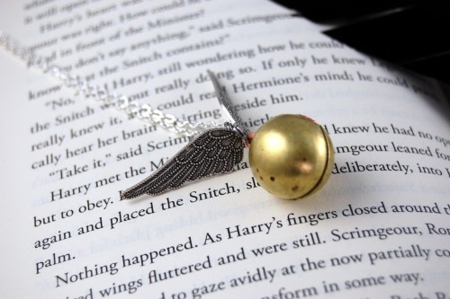 A Harry Potter golden snitch necklace that actually opens up!