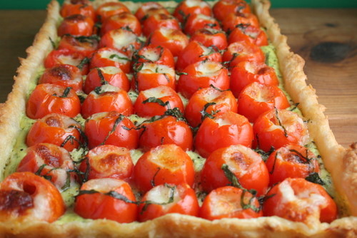 boyfriendreplacement:

Caprese Tart - cherry tomatoes stuffed with mozzarella nestled in a ricotta basil filling and puff pastry.
Recipe
