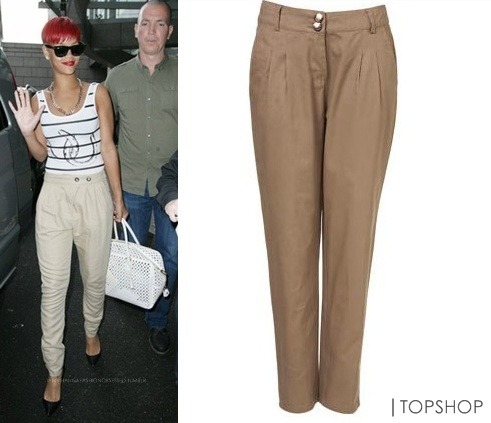 Rihanna wearing both Topshop clothings while in London last year. Wearing a white stripped body suit and a tailored Trouser which can be purchased at Topshop and as well as other retails you can find similar ones. You can even wear this casually or occasionally.
You can purchase this at Topshop for £35.00 .