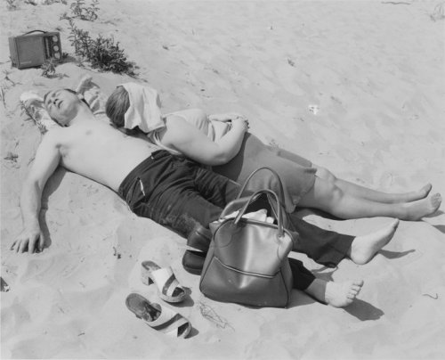 Chris Killip - Couple sleeping on the sand, South Shields, Tyneside, 1976via