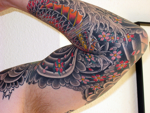 Gorgeously done sleeve via fuckyeahtattoos tattoos flowers
