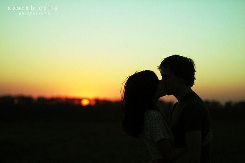 sunset love kiss. tagged as: kiss. couple. love.