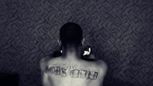 derrick rose tattoos on his back. derrick rose tattoos on his