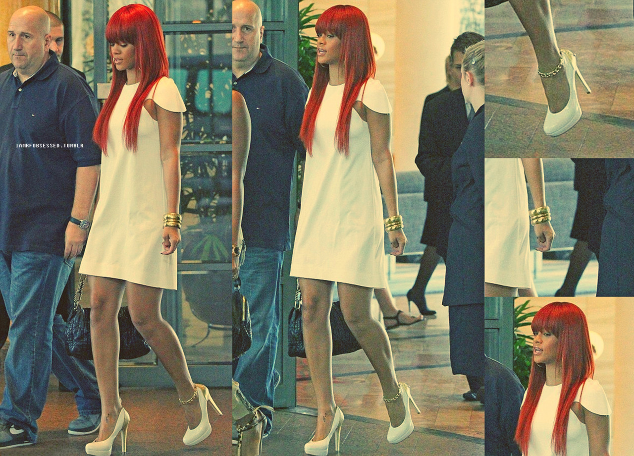 Rihanna leaving her Sydney hotel in a cute white shift dress and a pair of white and gold detailed heels.
Like the look?