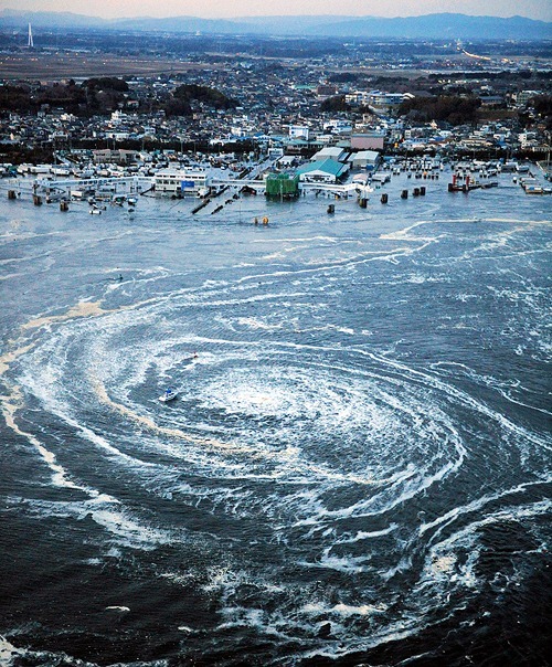 14feathers:

yerawizardharry:

March 11, 2011 - A whirlpool near Oarai City, Ibaraki Prefecture, northeastern Japan.


It’s tragic that this image is so devastating, but so utterly beautiful