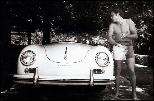 Great rare photo. James Dean pampering his 1955 356 Porsche Speedster. 