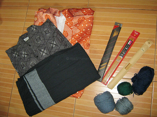 Japanese thrift shop haul from a few weeks ago. 2 kimonos, an obi, 3 sets of double pointed (?) knitting needles in 7, 10 and 12, and a few balls of yarn.



The knitting needles are in perfect condition, except for one size 12 needle that has a tiny bite mark on the tip. There was also a loose size 6 in the brown pack and a metal tube thing. Too bad I forgot to get the smaller knitting needle for the green yarn. The yarns are also good except for the dark blue one.



The shop didn&#8217;t have much choices on their kimonos. Most of them are heavily stained or have ugly prints/colors, so I settled for this gray one and a fire orange one. I still have to make/find a red obi for the orange.

All in all, I think it was a good haul! I&#8217;m going back in a few weeks to see if they have better kimonos. :D