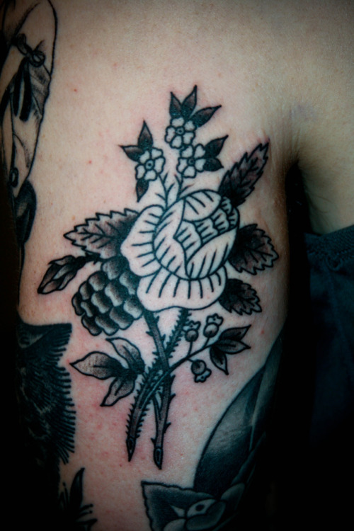 Older I tattooed these flowers last night on Kirk he has tons of black and