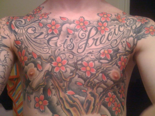 This is my boyfriends two years chest piece and this is his story Artist 