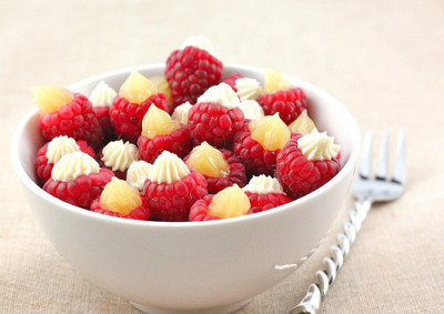 gastrogirl:

raspberries filled with no bake cheesecake and lemon curd.
