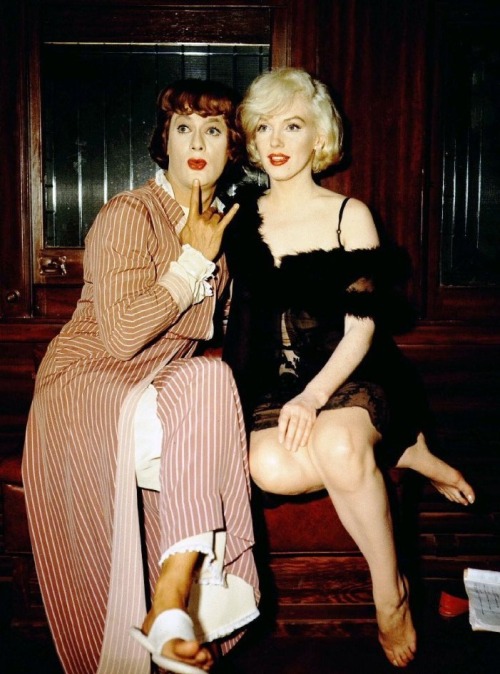 Marilyn Monroe & Tony Curtis (who I choose to believe is throwing horns) on the set of Some Like It Hot (1959, dir. Billy Wilder)
“[The tailor on Some Like It Hot] measured me, 16, 34, 43, 18, 19, 18,” Tony Curtis later recalled, “and then he goes to Marilyn - this is all in the same day and this is the truth…He comes in to Marilyn’s room and Marilyn had on a pair of panties and a white blouse and that’s all. He put the tape around her legs, looked up at Marilyn and said, ‘You know, Tony Curtis has got a better-looking ass than you.’ She was standing there, she unbuttoned her blouse, and said, ‘He doesn’t have tits like these!’”
For once, I think we need these salty stories, because Monroe needs all the salt she can get. The Marilyn industry is so deeply soaked in her crack-ups -shaking the poor woman until we can hear the slosh of booze and the rattle of pills -that it’s a relief to get back to the floozie with the forked tongue.
-Anthony Lane, excerpted from “On Billy Wilder”, The New Yorker