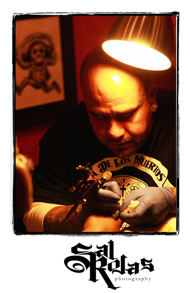 Tattoo Artist Johnny Garza of Mala Suerte Compania tattoos out of the