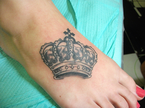Crown tattoo by paint splatter 