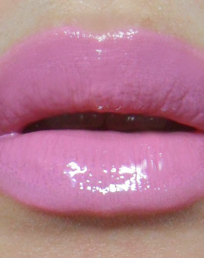 Lip Mix of the Day: Revlon Pink Pout + MAC Lavender Wind Lipglass
&#8212;-

Pink Pout is a beautiful and affordable soft-mauve which is sheerer than you would expect most matte lipsticks to be. And on some skins, it can look a little chalky and washed out.
Lavender Wind (Limited Edition**), like most other interesting, shimmery, sheer glosses, can sort of disappear on the lips, making you wonder what the whole point was in the first place. **MAC Oyster Girl is a nice replacement if you don&#8217;t have Lavender Wind. It&#8217;s also a nicer gloss on its own anyway.
So I just layered the translucent shimmer gloss over the matte lipstick. Recommended if you&#8217;re ready to graduate from barely there cool-toned lip products, but not quite sure about full-on lip color yet.