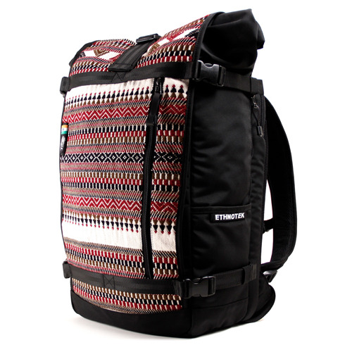 ETHNOTEK BAGS / WOVEN-INDIA 1
Ethnotek is a brand new start-up founded by Jake Orak.  The idea behind the company is simple: use high-quality, functional backpacks and messenger bags as a medium to promote ethnic cultures and artistry.
Every Ethnotek bag has a removable main front panel which the company calls THREADS.  These THREADS are made from fair-trade acquired textiles, sourced in-person and purchased directly from the artisan or village where they originated. That means each purchase of an Ethnotek bag directly supports artisan weaving communities around the world.
It&#8217;s hard to pick, but our favorite is the Woven-India 1.  Like Ethnotek&#8217;s entire collection, the Woven-India 1 includes a huge main compartment, separate laptop compartment, padded shoulder straps, and a bevy of pockets for ample stow away space.
The hand-loomed THREAD featured on this particular backpack is created by master weaver Vankar Shamji of Bhujodi-Gujarat, India.  Shamji and his family dye, loom, and weave the intricate textile by hand, using techniques that date back generations.  Here&#8217;s a closer look.

To learn more about Ethnotek, visit the company&#8217;s website.  You can also follow Ethnotek on Facebook.
$149