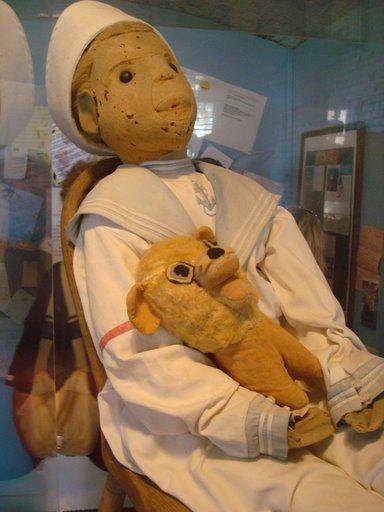 seborgasm:

fun-size-fanatic:

solluxbutts:

fuckyeahthebizarre:

Robert the DollHe sits under lock and key in a glass case located in the basement of a  museum in Key West, Florida. At first glance Robert may seem like a  harmless children’s doll. But looks can be deceiving, because Robert is the most haunted doll in the world.
In 1897, a family named Otto lived in a nearby house in Key West.  They owned a plantation and had a lot of servants working for them who  they treated very badly. One servant girl gave their son, Gene, a  present of a doll. What the Ottos didn’t realise was that this servant  girl knew voodoo.
Gene’s full name was Robert Eugene Otto. His parents had always  called him “Gene”, so he decided to give the doll his real name,  “Robert”.
Many strange things began to occur in the Otto household. Many  neighbors claimed to see Robert move about from window to window, when  the family were out. Gene began to blame Robert for mishaps that would  occur. The Otto’s claimed to hear the doll giggle, and swear they caught  glimpses of the doll running about the house.
Gene began to have nightmares and scream out in the night, when his  parents would enter the room, they would find furniture over turned,  their child in a fright, and Robert at the foot of the bed, with his  glaring gaze! “Robert Did It”…. The doll was eventually put up into the  attic. Where he resided for many years.
But Robert had other plans. Visitors that entered the house could  hear something walking back and forth in the attic, and strange giggling  sounds. Guests no longer wanted to visit the Otto home.
Gene Otto died in 1972.The home was sold to a new family, and the tale of Robert had died down…
But Robert waited patiently up in the attic to be discovered, once  again. The 10 year old daughter of the new owners was quick to find  Robert in the attic. It was not long before Robert unleashed his  displeasure on the child… The little girl claiming that the doll  tortured her, and made her life a hell.. Even after more than thirty  years later, she steadfastly claims that ” the doll was alive and wanted  to kill her.”
Robert, still dressed in his white sailor’s suit and clutching his  stuffed lion, lives quite comfortably, though well guarded, at the Key  West Martello Museum. Employs at the museum continue to give accounts of  Robert being up to his old tricks still today…

i love this story
i remember reading it a long time ago when i had my fascination with dolls

Gonna go visit him when I go down to the keys again.

visiting robert is actually on my bucket list.
