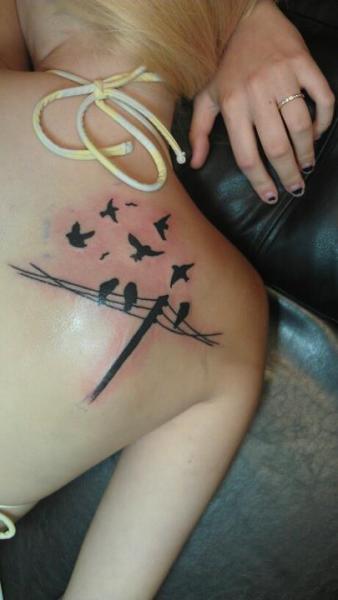 Done by Tina (AKA Tuna) Canezaro at a little place called Wicked Inc company in Volo, Illinois. 8/10/11
The whole experience was one I will never forget because this was my first tattoo. There&#8217;s no real back story as to why I got it, just that I really love the idea of flying and having no real attachments. Just being free. 