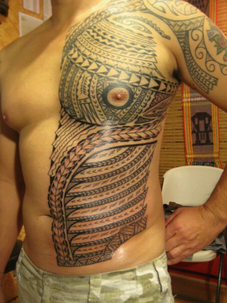 Stomach chest and shoulder polynesian design Artist Seymour Kaniho