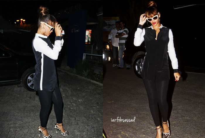 Rihanna partied in Brazil in a $495 Joseph Colorblock Tuxedo Blouse, $80 David Lerner Leggings, and $850 Giuseppe Zanotti Peep Toe Court Shoes in Leopard-Print Pony completing her look with her $740 Linda Farrow Luxe Cream Colored Cat Eye Sunglasses.