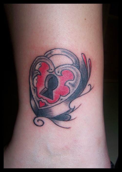 Adorable heart locket tattoo