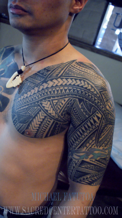 Half sleeve and chest tattoo by Samoan Mike SacredCenterTattoo