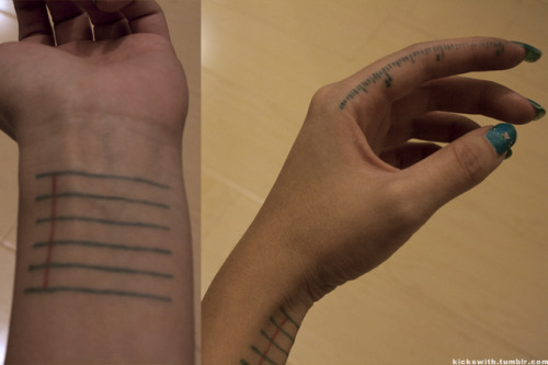 This is my ruler and notepad tattoo. I believe that tattoos can be used for functionality as well as memory. I&#8217;m a designer, so I use the ruler for buttons, zippers, and trim widths. Usually the notepad has an address or to-do list on it. :) 