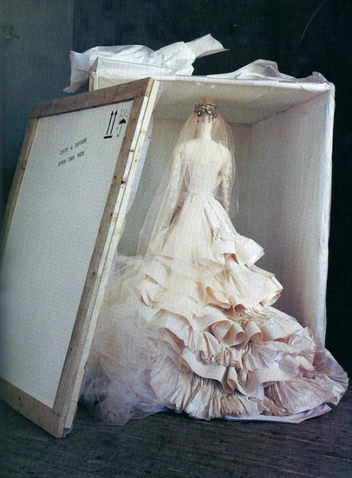 When shipped abroad a Christian Lacroix wedding dress travels upright in a