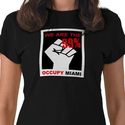 This Occupy Miami Gear is just one of the many examples of the Occupy Wall Street followers are able to share their message even if they have been evacuated from the streets.
(via Occupy Miami T-shirt from Zazzle.com)