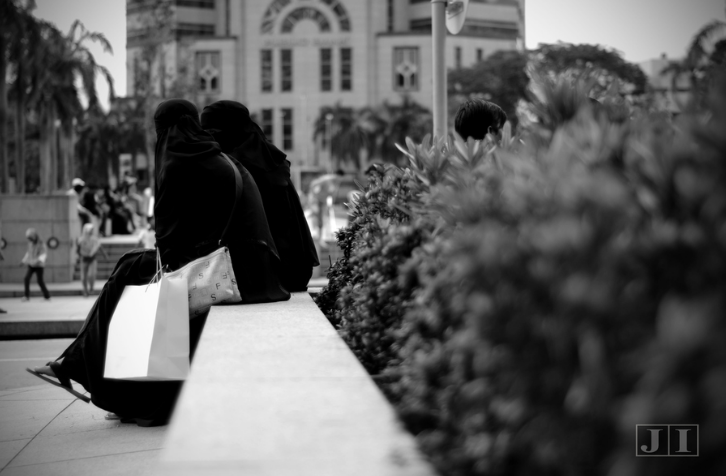 "My dear sister in Islam, I know that it is quite difficult for you to go out wearing Hijab in a society that mocks and torments you.   I know that you, indeed, feel strange and out of place.  However, if you knew the status of those who are mocked by the Kufar as well as the status of the strangers, you will continue to wear your Hijab (i.e. to cover your entire body with a Khimar as commanded (24:31), as well as with a Jilbab (33:59), with the exception of the hands and face;  however, knowing the recommendation to cover those parts (as well) with dignity. Allah subhanahu wa ta&#8217;ala says in His Book:
"Verily! (During the worldly life) those who committed crimes used to laugh at those who believed.  And whenever they passed by them, used to wink one to another (in mockery);  And when they returned to their own people, they would return jesting;  and when they saw them, they said: ‘Verily! These have indeed gone astray!’  But they (disbelievers, sinners) had not been sent as watchers over them (the believers).  But on this Day (the Day of Resurrection) those who believe will laugh at the disbelievers.  On (high) thrones, looking (at all things).  Are not the disbelievers paid (fully) for what they used to do?" [Surah Al-Mutaffifin 83:29-36]
Allah’s subhanahu wa ta&#8217;ala words should serve as a support for you my dear sisters.&#8221; 
(&#8216;The Hijab is beautiful&#8217; by Abu Abdullah Fattaah Salaah ibn Bearnard Brooks)