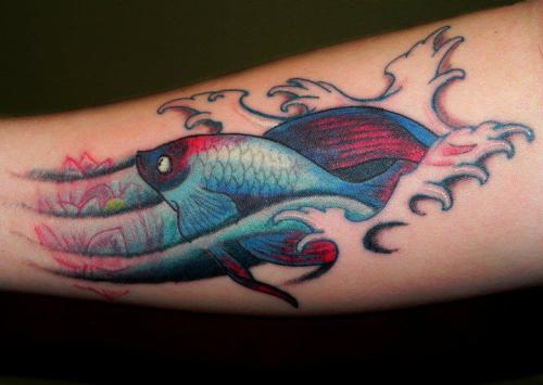 My fighting fish forearm piece drawn by me and brought to life by Brad Bonk