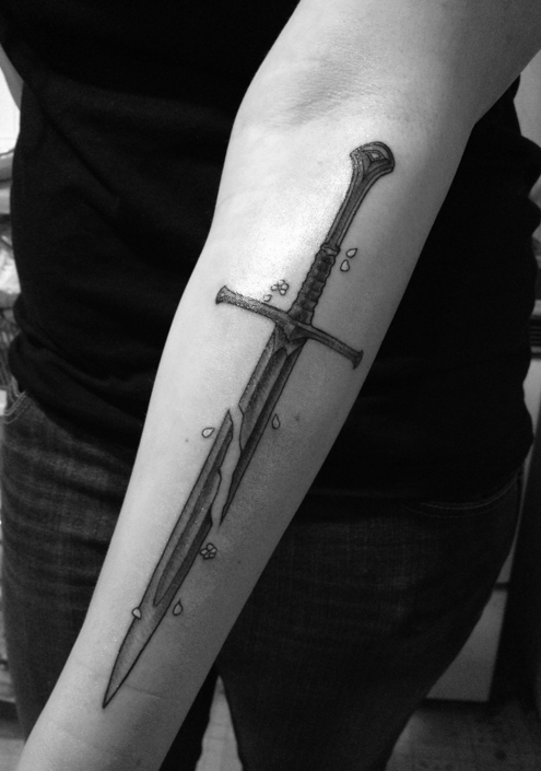 This is my first tattoo the Shards of Narsil the Sword of Kings