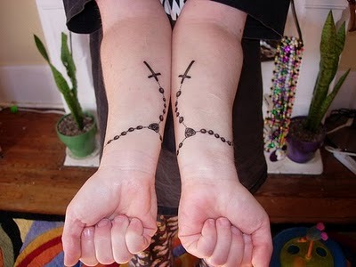 For me rosary tattoos are a great pick for wrist tattoos designs 