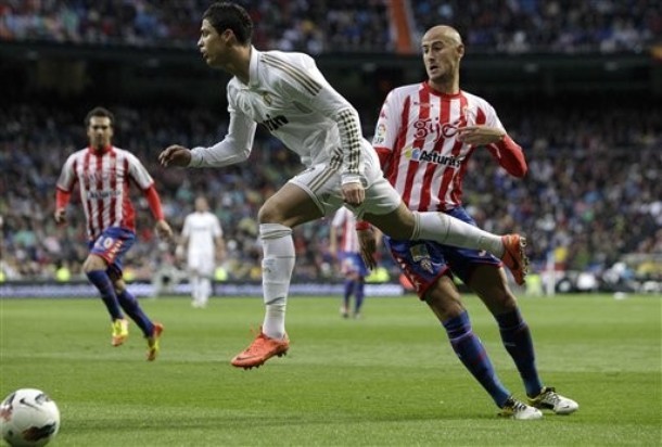Dynamic and graceful.
Real Madrid vs. Sporting Gijon 3:1, 14.04.2012(via Photo from AP Photo)