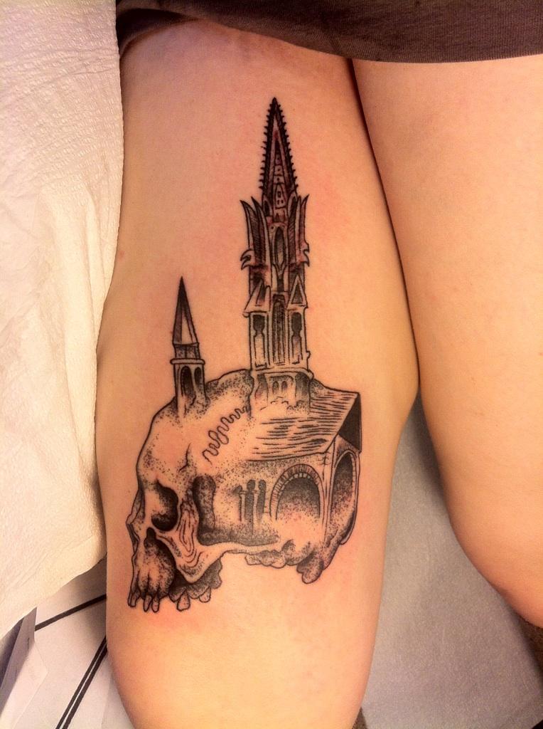 My friend Ali got the skull cathedral design tattooed on her leg at Tattoo