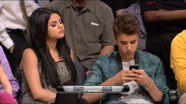 Selena and Justin at the Lakers Game