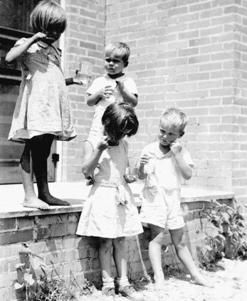 Children Brushing Teeth at School