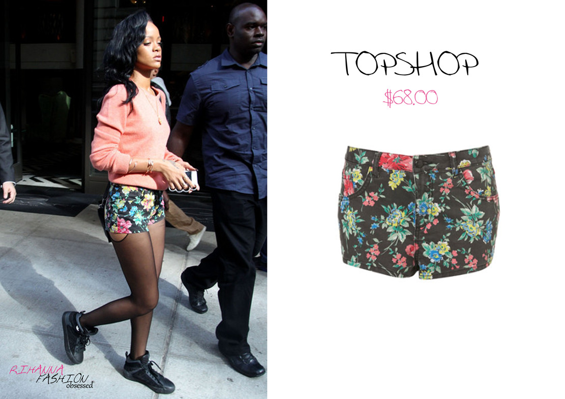 Rihanna out and about in NYC again in a peach or pink knit top followed by a pair of Topshop Moto floral print denim jeans available for $68.00 (£34.00)  and  lastly completed her look with a pair of original Adidas shoes.