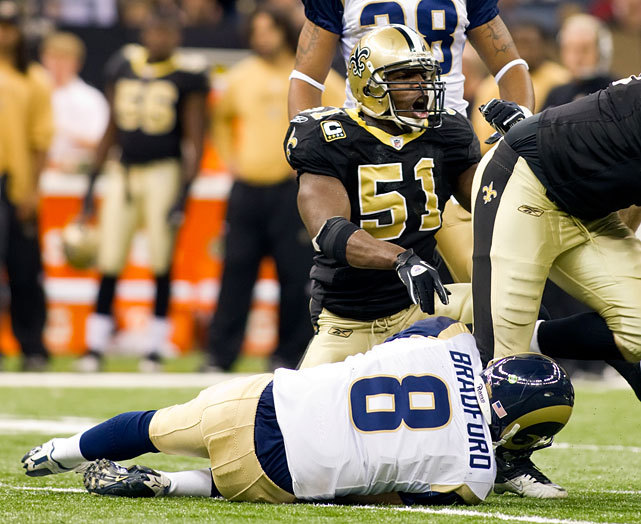 Jonathan Vilma stands over Sam Bradford after laying him out for a sack during a 2010 Saints-Rams game. The NFL suspended Vilma for the entire 2012 season for his role in the Saints bounty scandal. (John Korduner/Icon SMI)
BANKS: Saints will feel impact of Payton&#8217;s suspension
