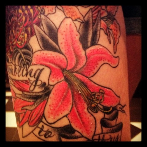  lily tattoo almost healed on Kyle Taken with Instagram at Tower Classic 