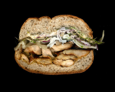 Jin Market: Grilled Chicken, Sprouts, Onions, Provolone, Mayo, Mustard, On a Whole Wheat Roll.