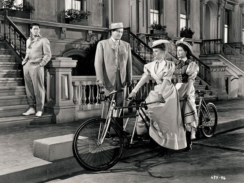 Janis Paige and Dorothy Malone ride a bike Don DeFore and Dennis Morgan 
