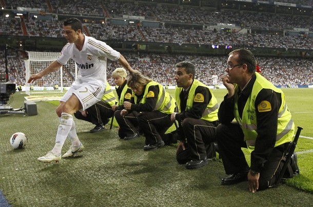 Cristiano too fast to stop before the line  :o)
Real Madrid vs. Mallorca 4:1, 13.05.2012(via Photo from Reuters Pictures)