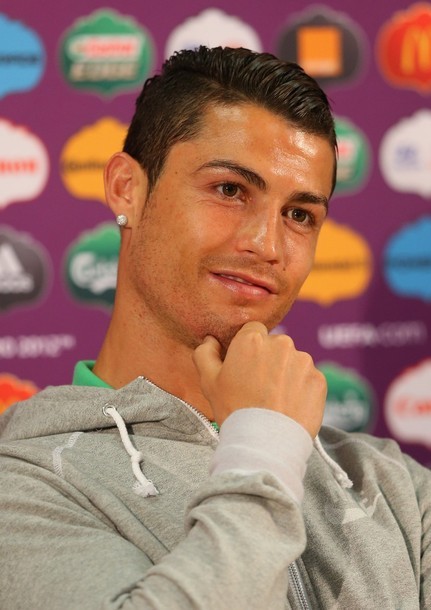  Cute Cristiano at the press conference, 08.06.2012(via Photo from Getty Images)