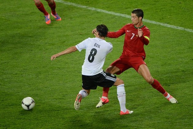 The RM team-mates on opposite sides.
Portugal vs. Germany, EURO 2012&#160;09.06.2012(via Euro 2012 Photos | Pictures - Yahoo! Sport UK)