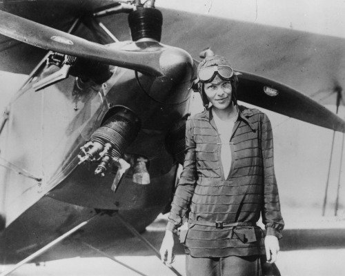 willigula:

Amelia Earhart in front of her first airplane, a Kinner Airster, c. 1921
