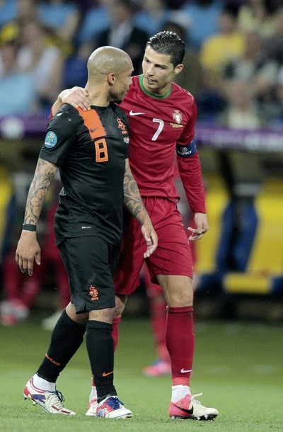 Friendly little chat with de Jong ♥ 
EURO 2012 - Portugal vs. Netherlands 2:1, 17.06.2012(via Photo from Reuters Pictures)