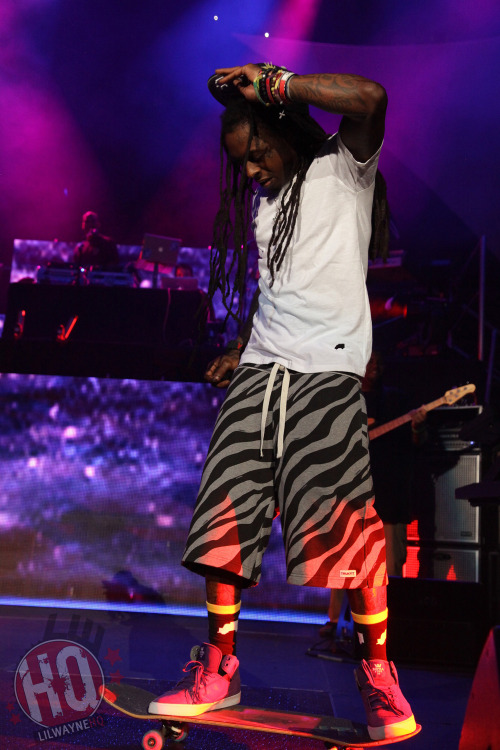 Lil Wayne rocking a TRUKFIT hat, TRUKFIT t-shirt, TRUKFIT shorts and TRUKFIT socks - http://www.lilwaynehq.com