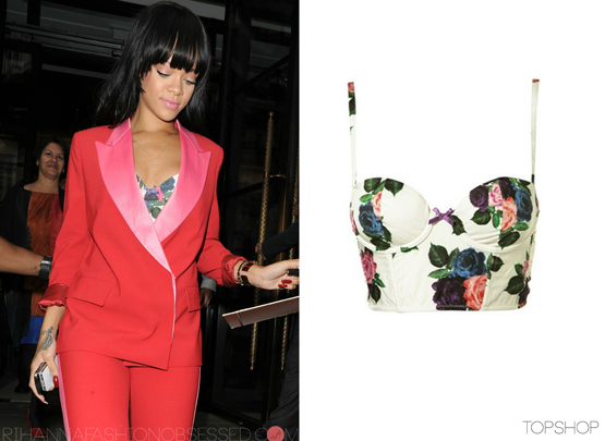 Update: Rihanna showing her love for Topshop once again while in London yesterday in one of their floral bralet (£20.00), sadly out of stock but Topshop has variates of bralets to choose from on the main site.
Rihanna&#8217;s suit is by designer Acne from the A/W 2012 collection. 
