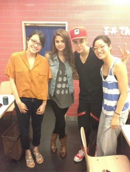 Justin Bieber and Selena Gomez with fans in Japan
